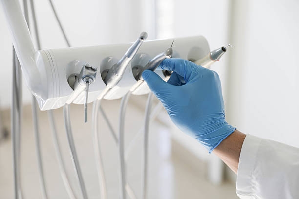 Professional Tooth Extraction technician working in Oak Park, IL